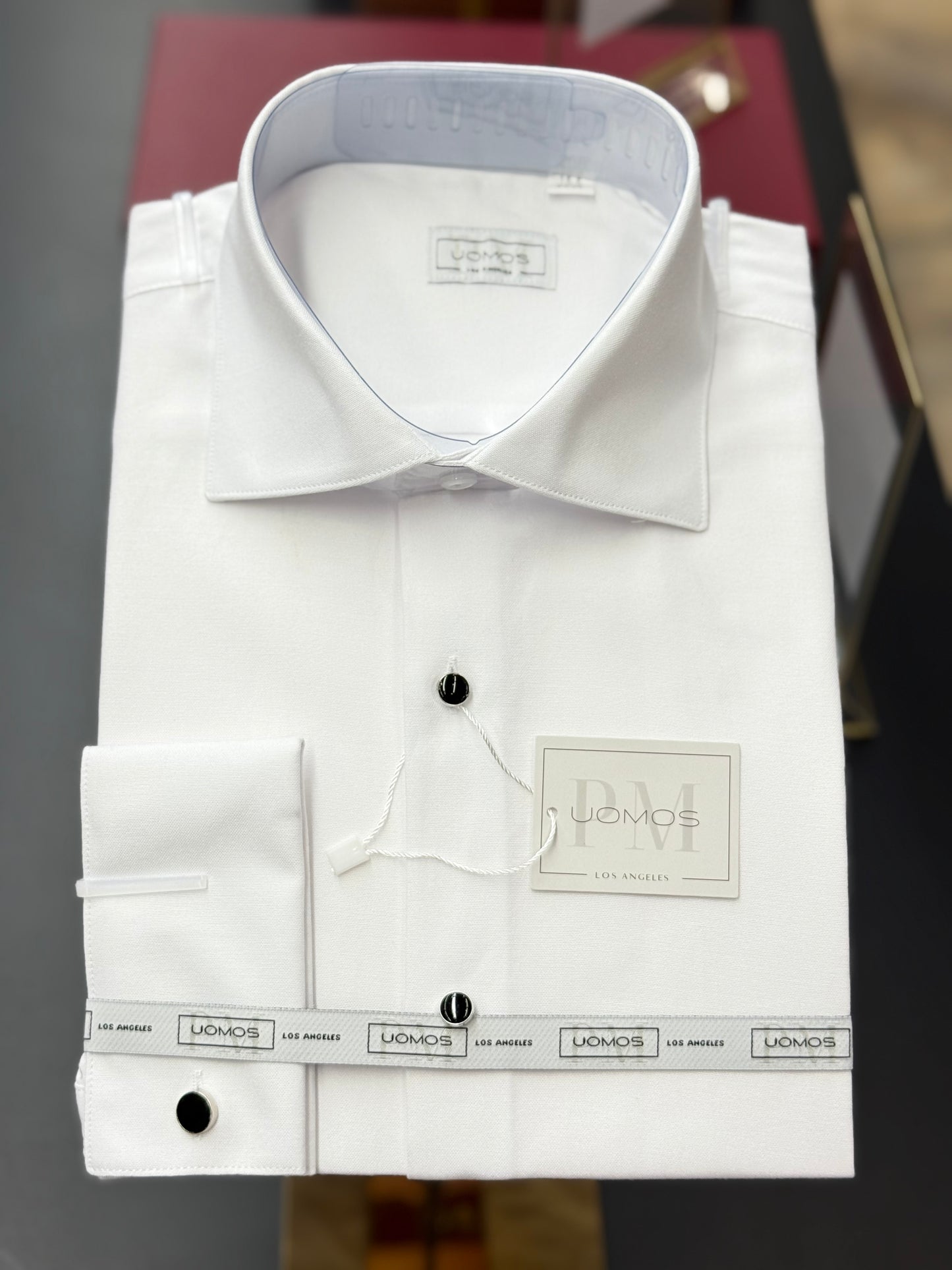 Tuxedo White shirt, tuxedo buttons, spread collar, french cuffs.