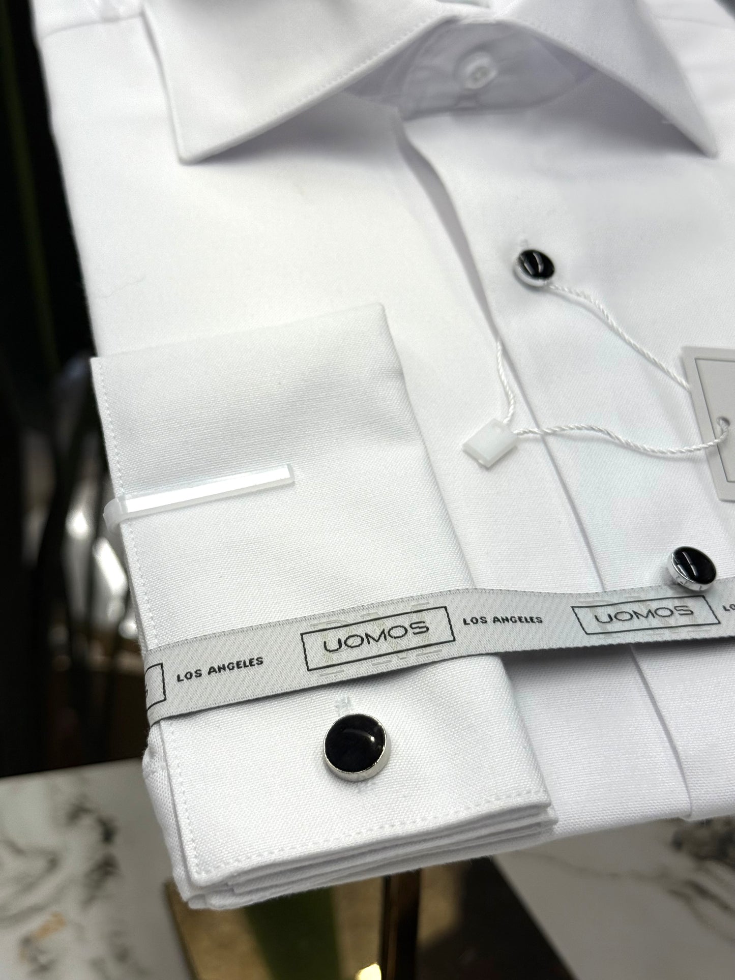Tuxedo White shirt, tuxedo buttons, spread collar, french cuffs.