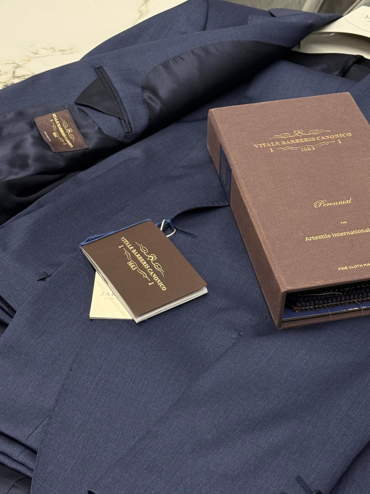 The Vitale Barberis Canonico Italian Wool Suit in Textured Navy Slim Fit